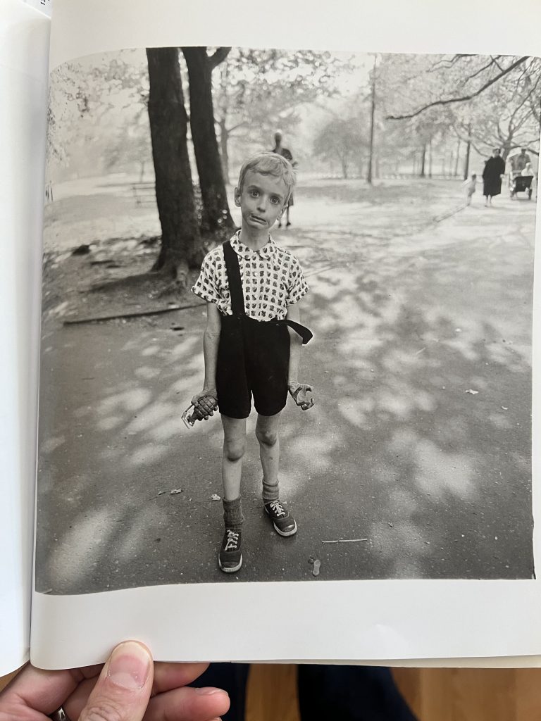 A picture of a reproduction of Diane Arbus's photography "Child with Toy Hand Grenade in Central Park, N.Y.C. 1962"