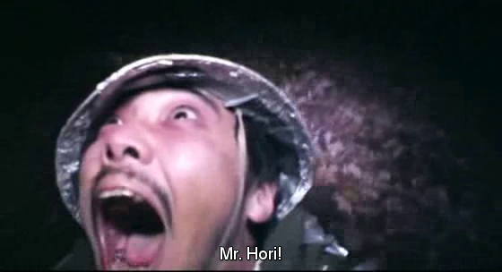 A still image of Mr. Hori from "Noroi: The Curse"