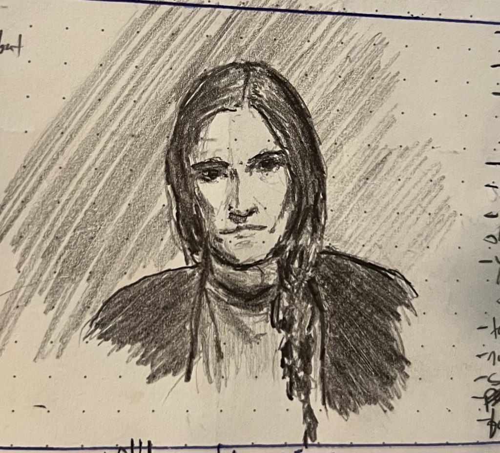 Pencil sketch of a Latina woman with a thick braid staring down the viewer.