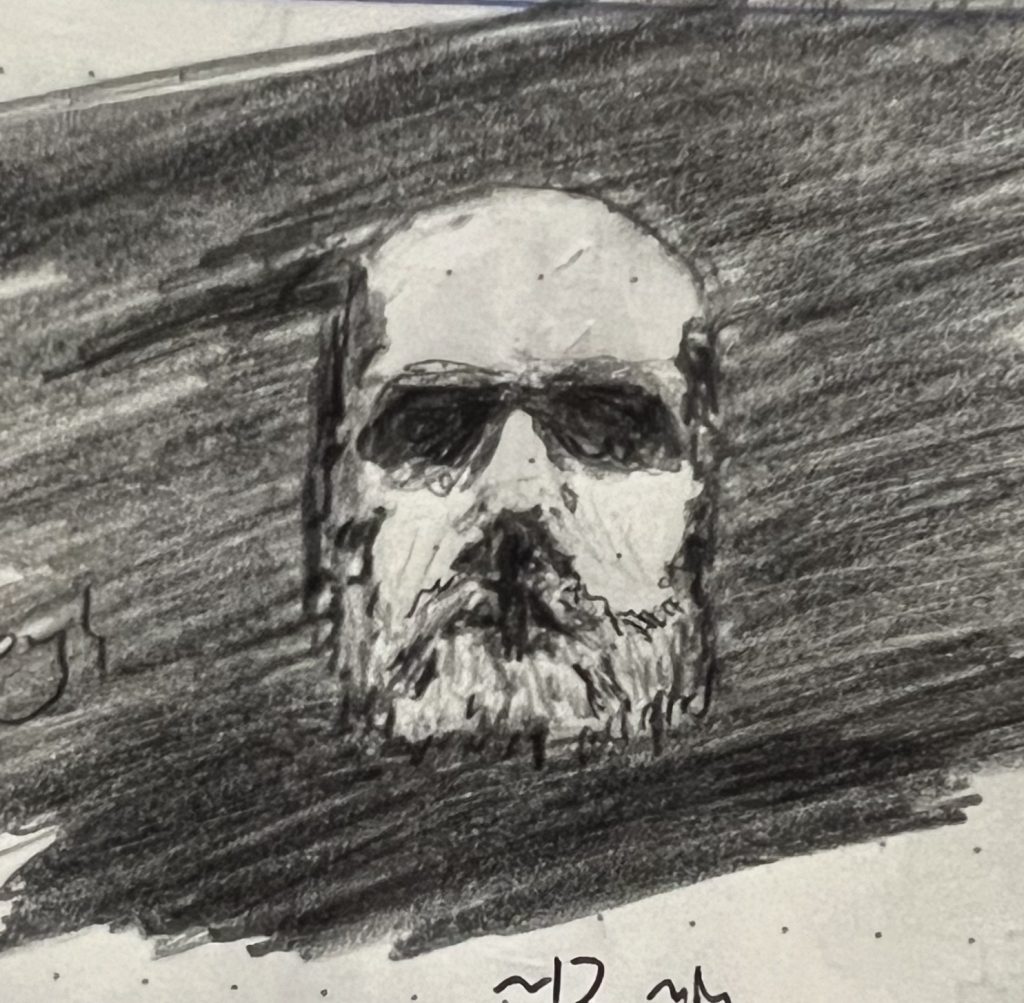 A pencil sketch of a bearded man lit from above with hard shadows that make him look like a floating skull.